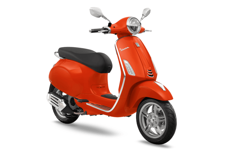 Vespa Primavera 125 i-get ABS FL搶眼新色「霓虹橘」如同火紅的夕陽餘暉，展現對自由生活的熱情與渴望。(圖片提供：太古鼎翰)